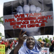 A woman holds a sign as members of Lagos-based civil-society groups hold rally calling for the release of missing Chibok schoolgirls at the state government house in Lagos, Nigeria, May 5, 2014.
PIUS UTOMI EKPEI/AFP/Getty Images